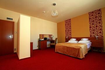 Фото номера Апартаменты с гидромассажной ванной Отель Hotel Rydzewski г. Элк 6