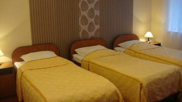 Фото номера Трехместный номер Отель Hotel Rydzewski г. Элк 4